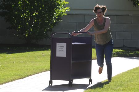 Book carts can already get out of control quickly, so careening them along a twisty course was treacherous indeed.