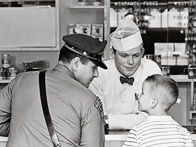 Norman Rockwell recruited Stockbridge neighbors, including state trooper Richard Clemens and 8-year-old Eddie Locke, to model for The Runaway.