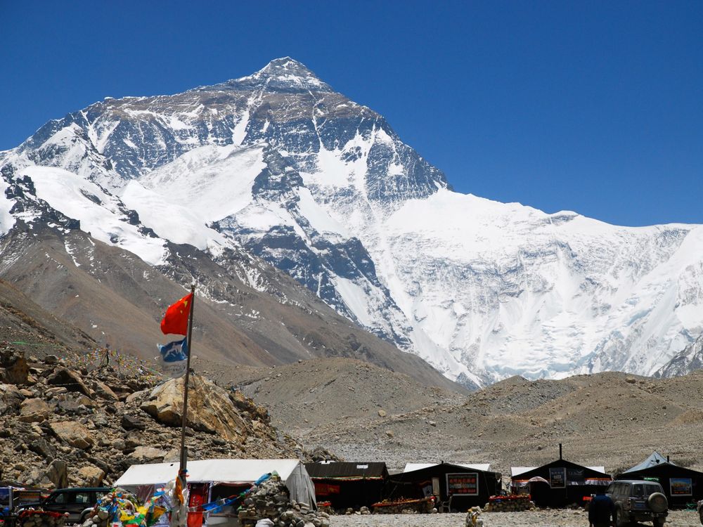 A photo of the Mount Everest base camp with Mount Everest in the background 