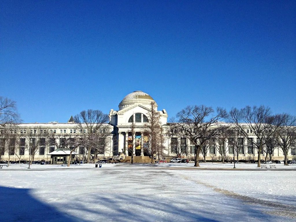 A building in winter surrounded by snow.