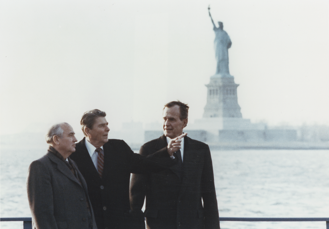 L to R: Gorbachev, Reagan and George H.W. Bush in 1988