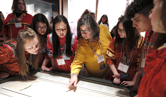 Members of the Cherokee Youth National Choir taking part in the installation of the Treaty of New Echota at the National Museum of the American Indian in Washington, D.C. (Paul Morigi/AP Images for the Smithsonian)