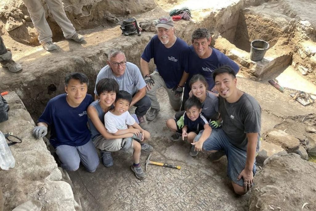 Archaeologists posing