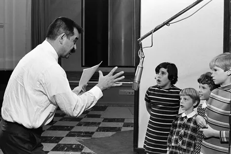 Producer Lee Mendelson directs children who are recording the dialogue for the animated TV special "It's the Great Pumpkin, Charlie Brown."