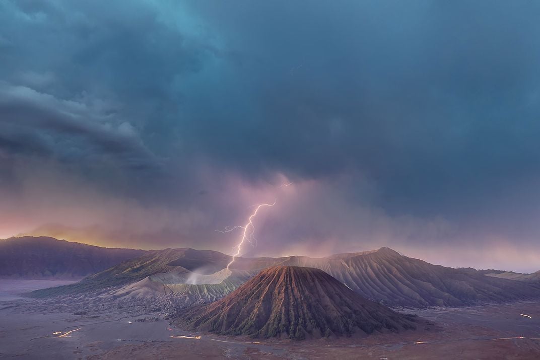 lightning bolt over mountains