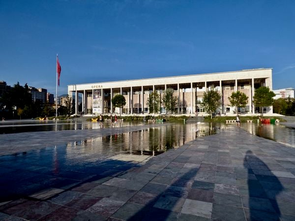Theater of Opera and Ballet reflected in cooling waters of Skanderbeg Square slots thumbnail