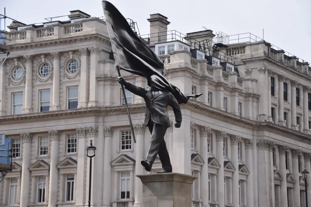 Banksy Confirms New London Statue of Flag-Blinded Man Stepping Off Pedestal — image 2