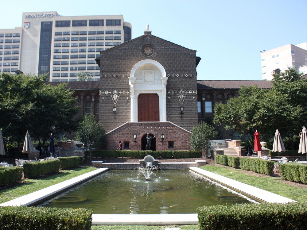 The front garden, reflecting pool and main entrance of the Penn Museum