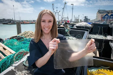 Lucy Hughes holds a piece of MarinaTex.