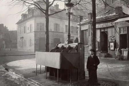 Photographer Charles Marville captured this snapshot of an open-air urinal with three stalls in 1865.