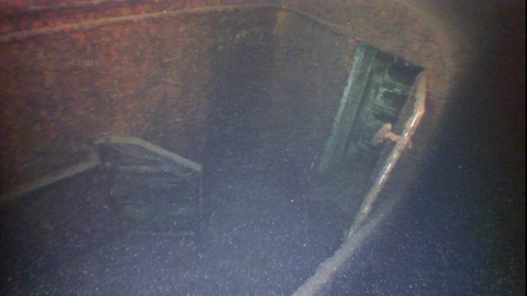 Underwater image of open door on shipwreck