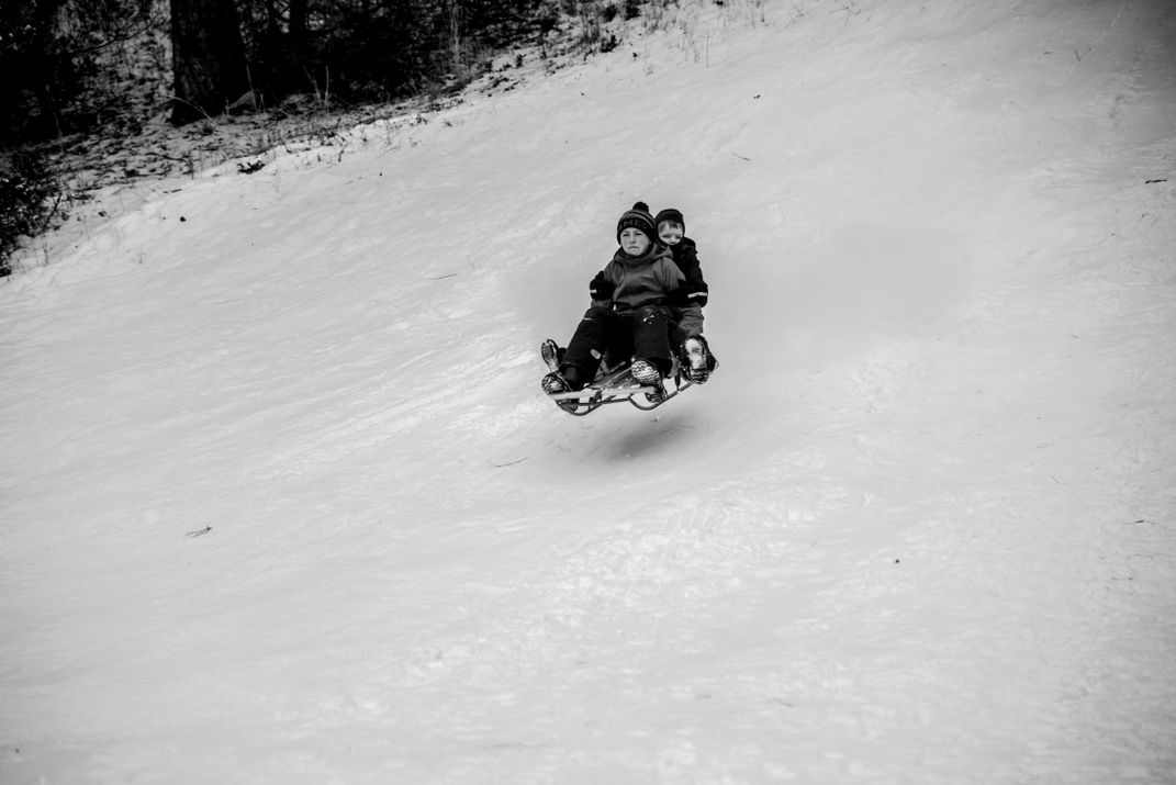 10 - Santa Claus would take pride in the lift-off achieved by these young sledders. Who requires reindeer?