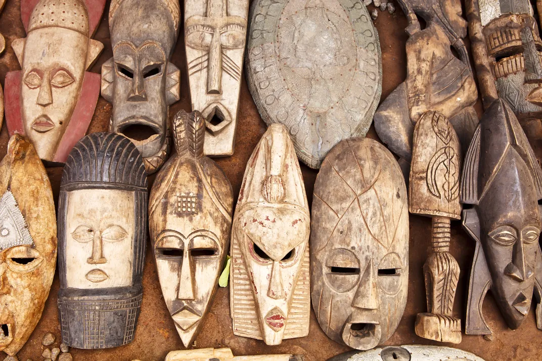 Carved wooden masks in a Ghanaian market