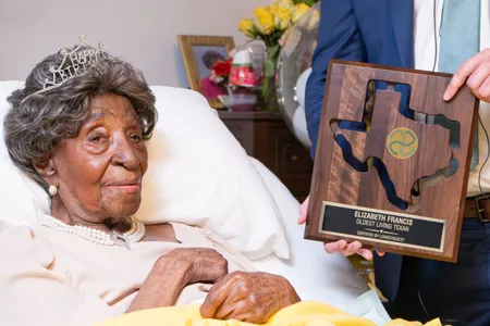 Elizabeth Francis received a plaque for being the oldest living Texan at her 114th birthday celebration last year.