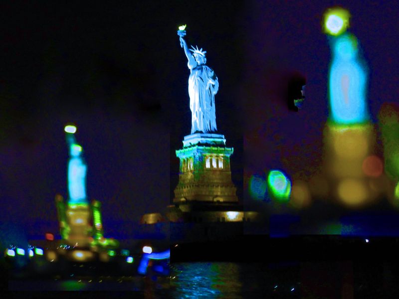 Three Statues of Liberty at Night Smithsonian Photo Contest