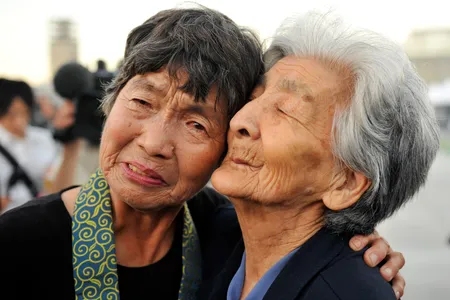 Tsuyuko Nakao, 92 and Kinuyo Ikegami, 77 both survived the atomic bombing in Hiroshima, pictured here in 2010.
