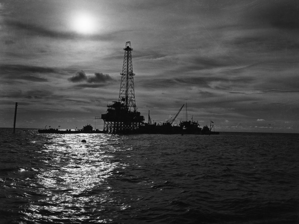 an oil well seen above the water