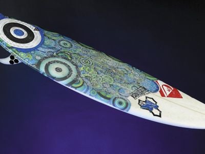 This custom-made board carried Kelly Slater to victory in Australia in 2010; the champion got his first surfboard at age 8 and from that moment, he says, “I was hooked.”