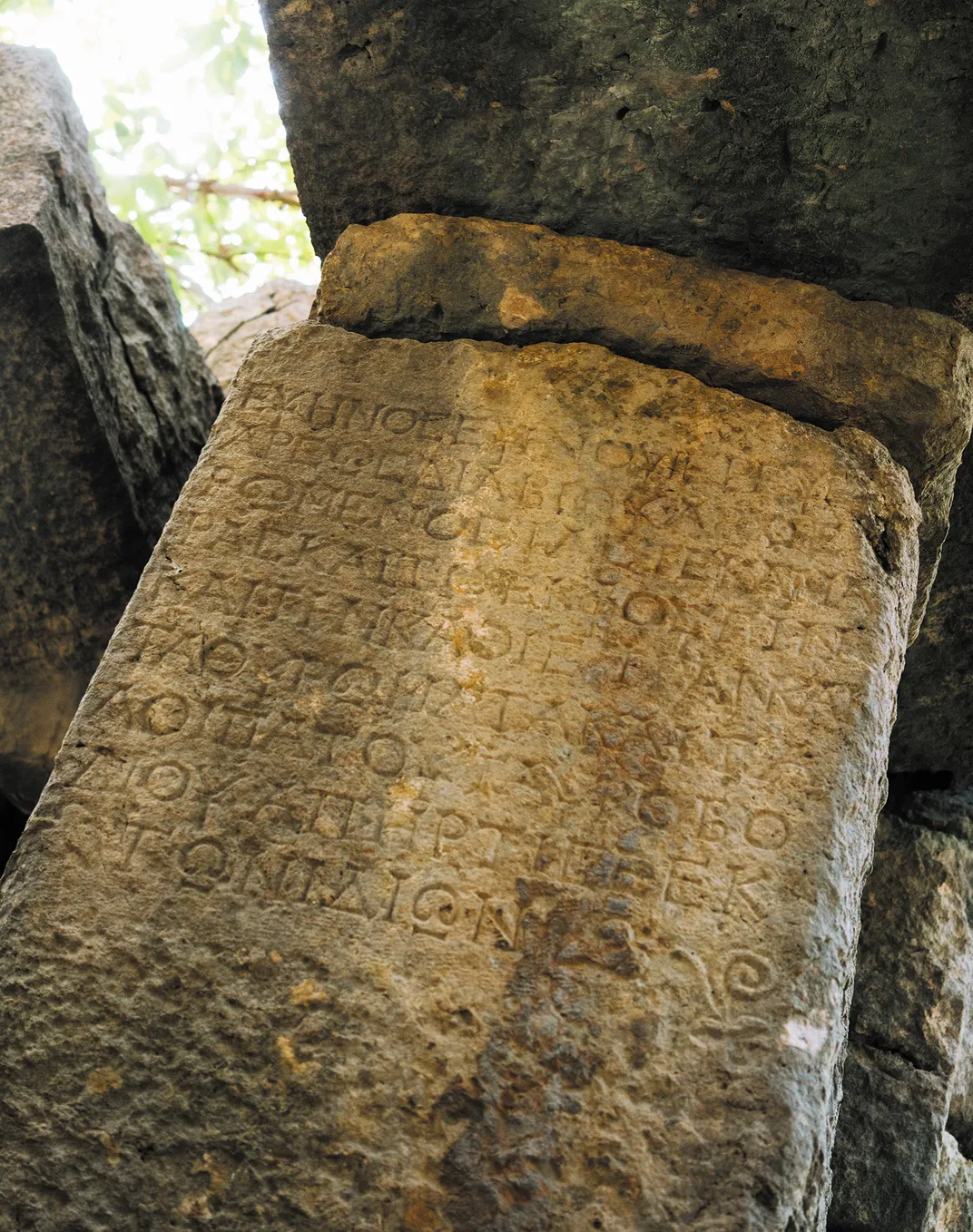 an inscribed slab in Pednelissos, describing Hellenistic-era repairs made to the city walls