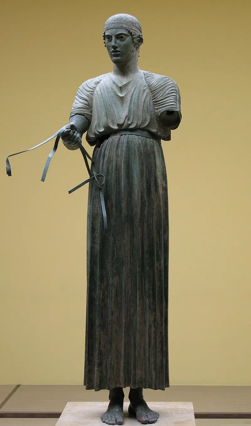 An ancient Greek statue known as the Charioteer of Delphi