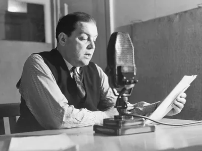 Sefton Delmer reads in the radio booth in 1941.