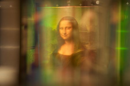 A scientist says a multispectral analysis of the Mona Lisa shows hidden portraits beneath the famous painting.