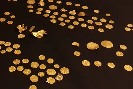 An unnamed treasure hunter discovered the majority of the coins and gold objects between 2014 and 2020.