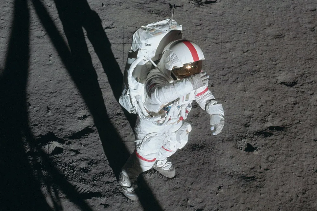 astronaut shielding eyes