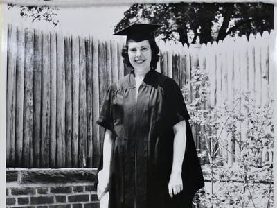 Crimilda in cap and gown, Courtesy of Western Michigan University Special Collections, Crimilda Pontes Graphic Arts Archive. 