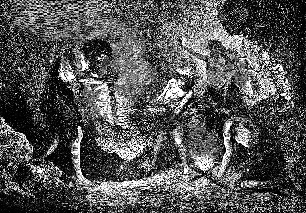 black and white illustration of caveman gathering wood and kindling for fire inside of a cave