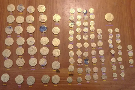 While roughly three dozen of the stolen coins have been recovered, 13 are still at large.