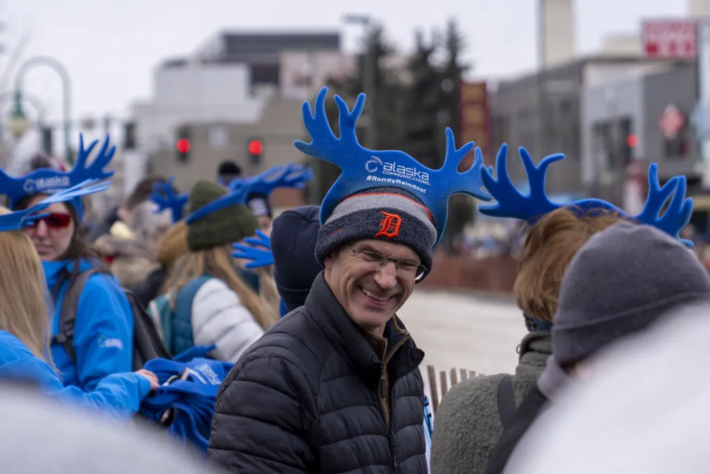Running of the Reindeer participants in foam antlers