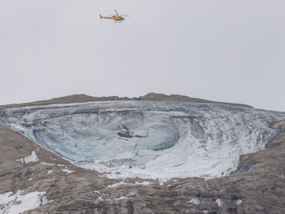 Helicopter above glacier