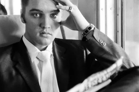 Elvis on the Southern Railroad between Chattanooga and Memphis, Tenn. July 4, 1956