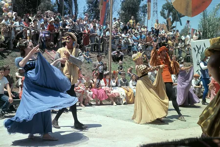 Performers at the 1963 Renaissance Pleasure Faire. Ron Patterson, a co-founder of the event, appears in orange at the far right.