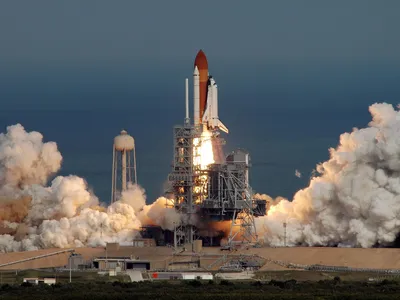 Launch of the STS-122 shuttle mission from Cape Canaveral. Re-entry is quieter, but more spectacular visually.