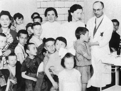 Jewish doctors give medical examinations in the Warsaw Ghetto