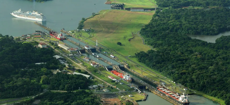  Ships moving through a lock in the Panama Canal. Credit: Hemis/Alamy