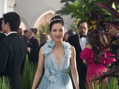Constance Wu's character, Rachel Chu, wears the gown to a wedding