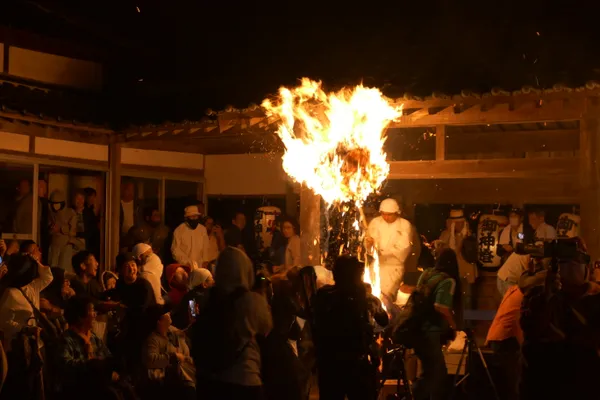 People cheering as burning sparks approach thumbnail