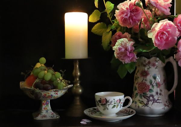 Candle,china teacup and flowers thumbnail