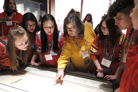 Members of the Cherokee Youth National Choir taking part in the installation of the Treaty of New Echota at the National Museum of the American Indian in Washington, D.C. (Paul Morigi/AP Images for the Smithsonian)