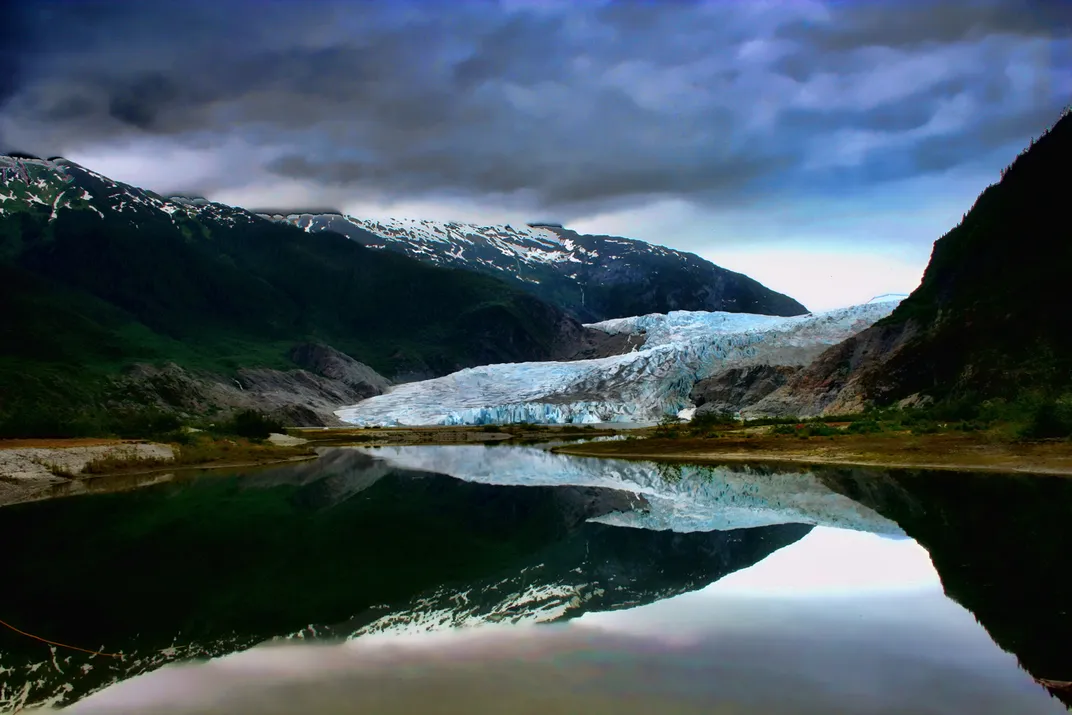 Visitors can watch blue icebergs float along the 13-mile-long river of ice leading to Mendenhall Lake.