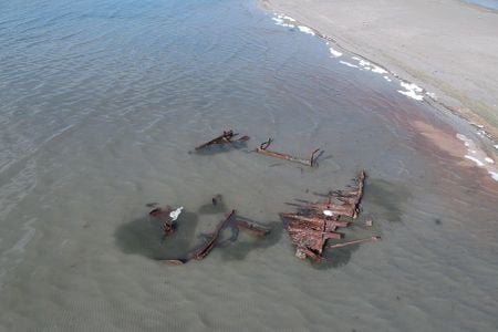 A storm on the Great Salt Lake in Utah exposed the wreckage of what may be a 100-year-old boat.