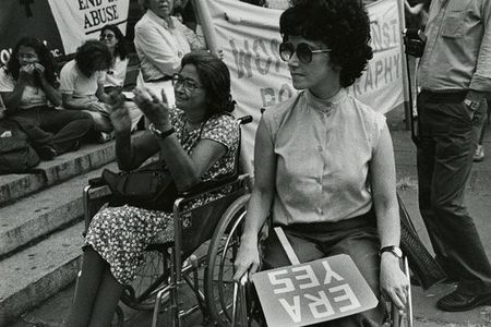 Two supporters of the Equal Rights Amendment demonstrate in August 1980. 
