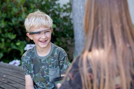 A child tests the Superpower Glass.