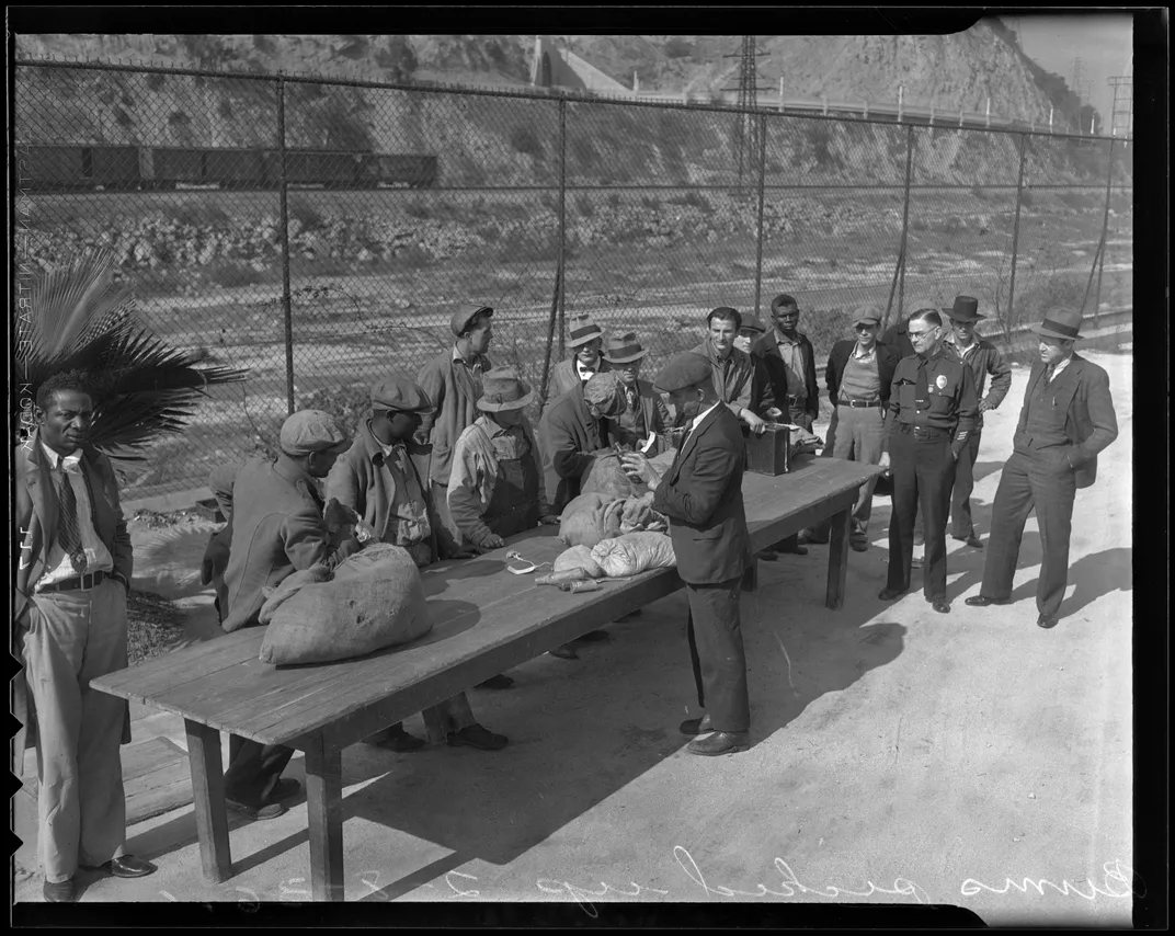 Travelers stopped at the California border by Los Angeles police in February 1936