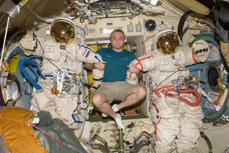 Cosmonaut Maksim Suraev, palling around with two empty spacesuits, was the first Russian to blog from space, giving citizens a look into orbital goings-on.