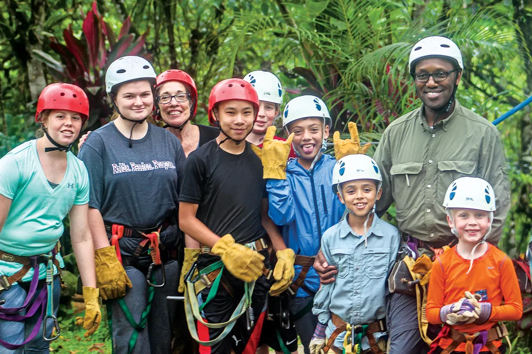 Kids and parents prepare for the rain forest zip line. Credit: Dennis Wille