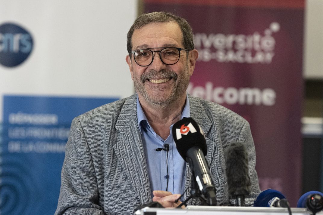 Alain Aspect at a press conference in Palaiseau, France, after winning the Nobel Prize.